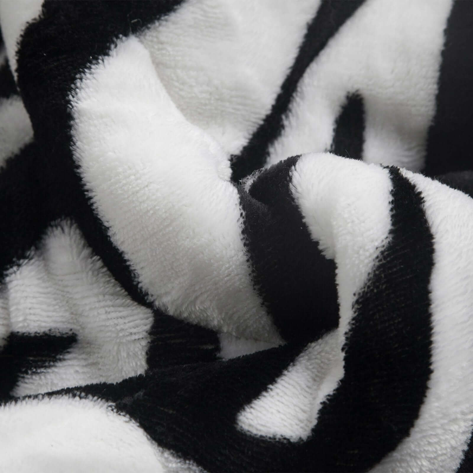 Wendebettdecke: weiß und schwarz