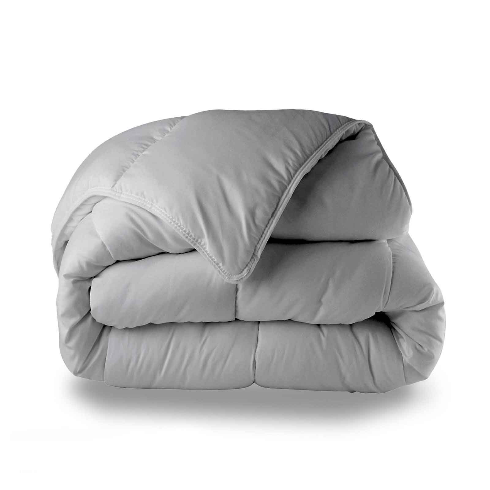 Couette 4 saisons : réversible et transformable en oreiller