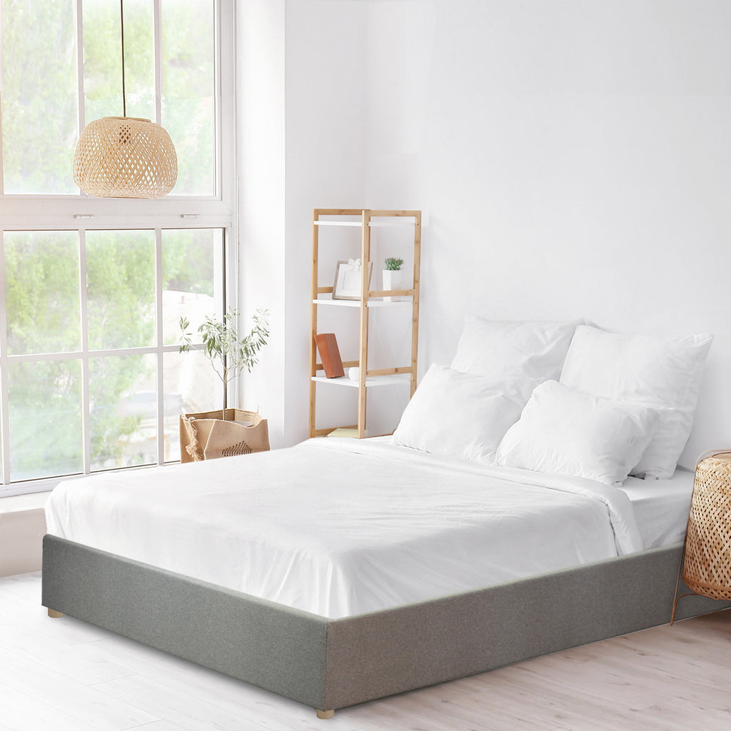 Lit déhoussable Magic'Bed : revêtement extérieur élégant en tissu et sommier à lattes flexibles en bois